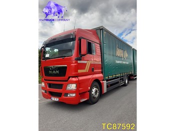 Curtainsider truck MAN TGX 440 Euro 5: picture 1