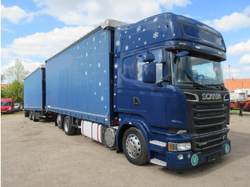 Curtainsider truck SCANIA R 560