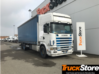 Curtainsider truck Scania R 124: picture 1