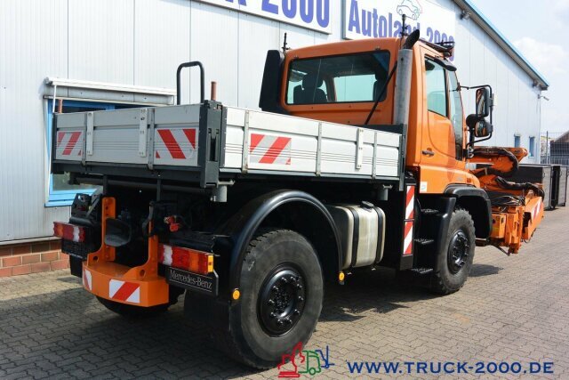 Dropside/ Flatbed truck, Municipal/ Special vehicle Unimog U400 4x4 Mulag Teleskop + Frontausleger Klima: picture 12