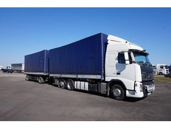 Curtainsider truck VOLVO VOLVO SCHMITZ CARGOBULL FH 400 FH 400: picture 1