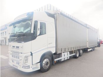 Curtainsider truck Volvo FH460 6x2 tandem: picture 1