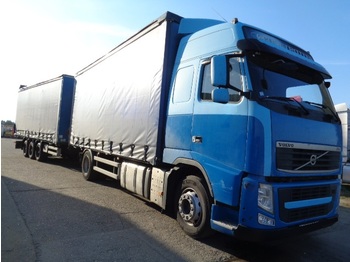 Curtainsider truck Volvo FH 460 Combi 5 axles retarder: picture 1