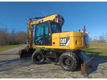 Wheel excavator CATERPILLAR M313D
