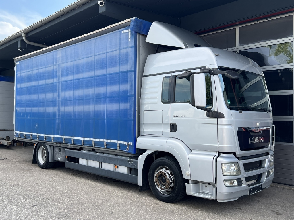 MAN TGS 18.360 16-GangSplit Klima 6,8mFestaufb304'km - Curtainsider truck: picture 1 MAN TGS 18.360 16-GangSplit Klima 6,8mFestaufb304'km - Curtainsider truck: picture 1