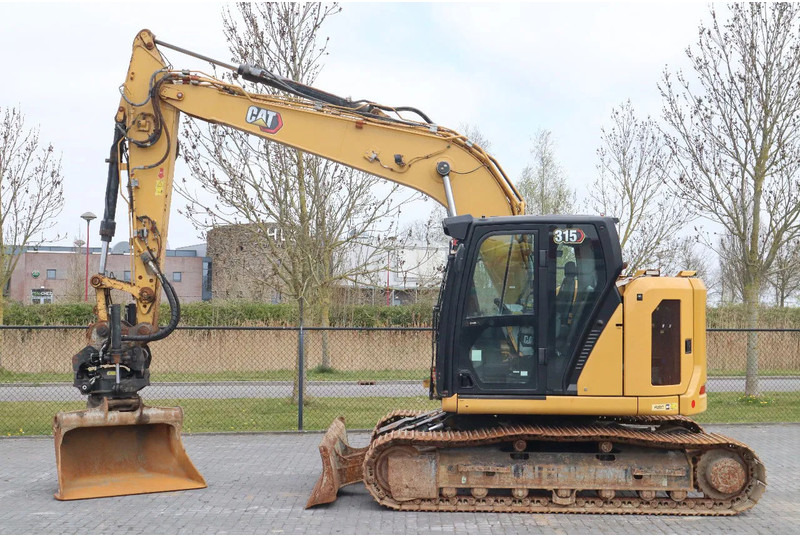 Caterpillar 315 07B | ROTOTILT | BUCKET | DOZERBLADE - Crawler excavator: picture 1 Caterpillar 315 07B | ROTOTILT | BUCKET | DOZERBLADE - Crawler excavator: picture 1