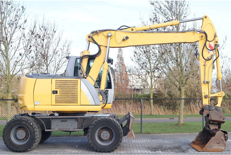 New Holland MH CITY | TILT BUCKET | QUICK COUPLER | DOZER BLADE - Wheel excavator: picture 4 New Holland MH CITY | TILT BUCKET | QUICK COUPLER | DOZER BLADE - Wheel excavator: picture 4