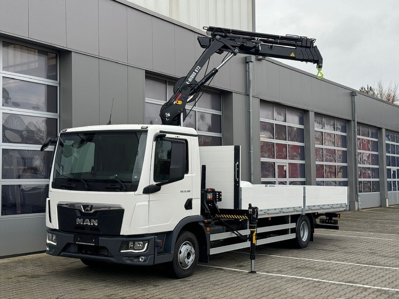 MAN TGL 12.190 4x2 BL TGL 12.190 4x2 BL mit Kran Hiab Hiduo 072DS-4 - Dropside/ Flatbed truck, Crane truck: picture 1 MAN TGL 12.190 4x2 BL TGL 12.190 4x2 BL mit Kran Hiab Hiduo 072DS-4 - Dropside/ Flatbed truck, Crane truck: picture 1