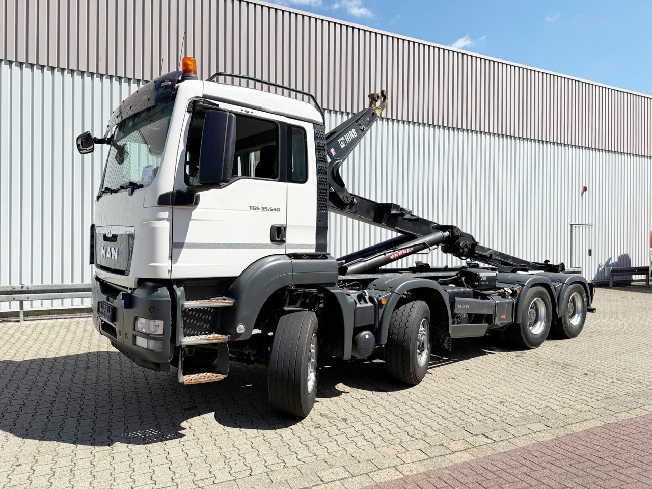 MAN TGS 35.540 8x6H BL TGS 35.540 8x6H BL, HydroDrive, PriTrader, Hiab Abrollkipper bis 7 m - Hook lift truck: picture 1 MAN TGS 35.540 8x6H BL TGS 35.540 8x6H BL, HydroDrive, PriTrader, Hiab Abrollkipper bis 7 m - Hook lift truck: picture 1