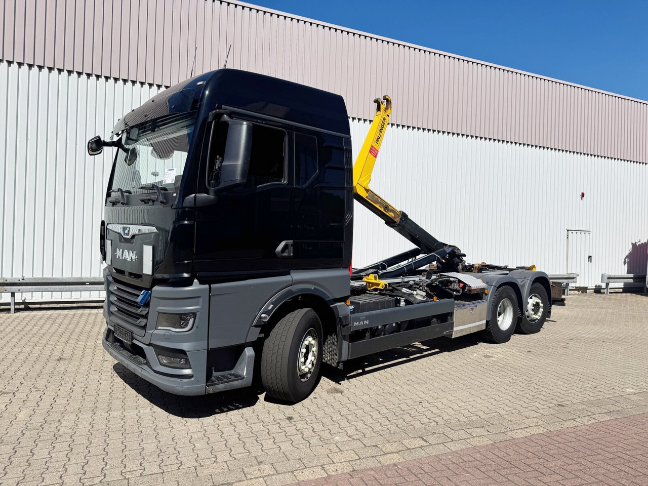 MAN TGX 26.510 6X2-4 BL TGX 26.510 6X2-4 BL, Lenk-/Liftachse, Funk - Hook lift truck: picture 1 MAN TGX 26.510 6X2-4 BL TGX 26.510 6X2-4 BL, Lenk-/Liftachse, Funk - Hook lift truck: picture 1