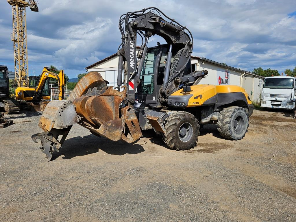 MECALAC 12 MXT - Wheel excavator: picture 1 MECALAC 12 MXT - Wheel excavator: picture 1
