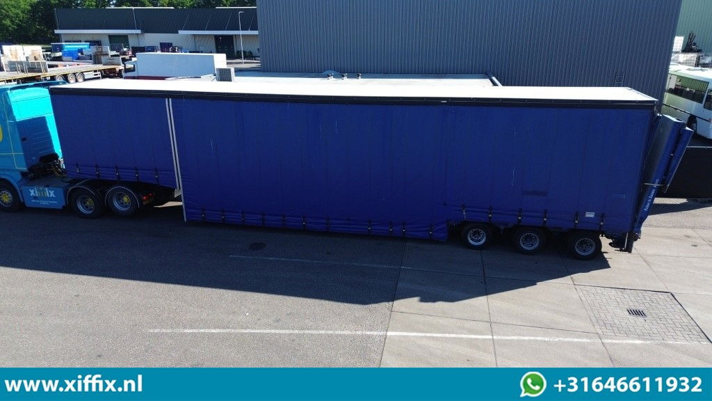 Goldhofer 3-ass. Dieplader met huifopbouw / Hydr. Hefbed en kleppen / 3x gestuur - Low loader semi-trailer: picture 2 Goldhofer 3-ass. Dieplader met huifopbouw / Hydr. Hefbed en kleppen / 3x gestuur - Low loader semi-trailer: picture 2