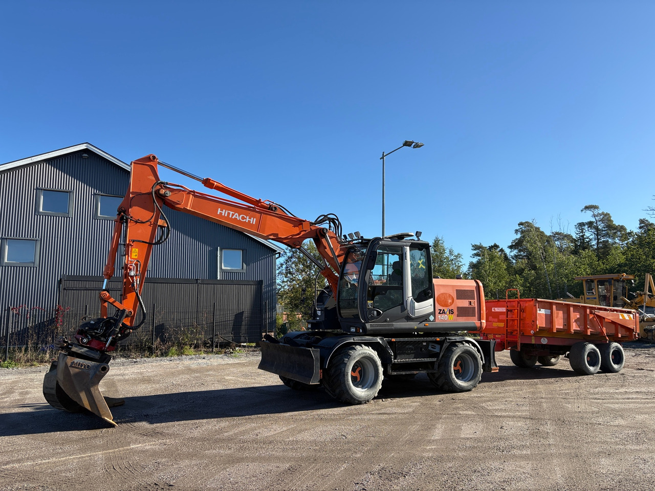 Hitachi ZX140W-3 - Excavator: picture 1 Hitachi ZX140W-3 - Excavator: picture 1