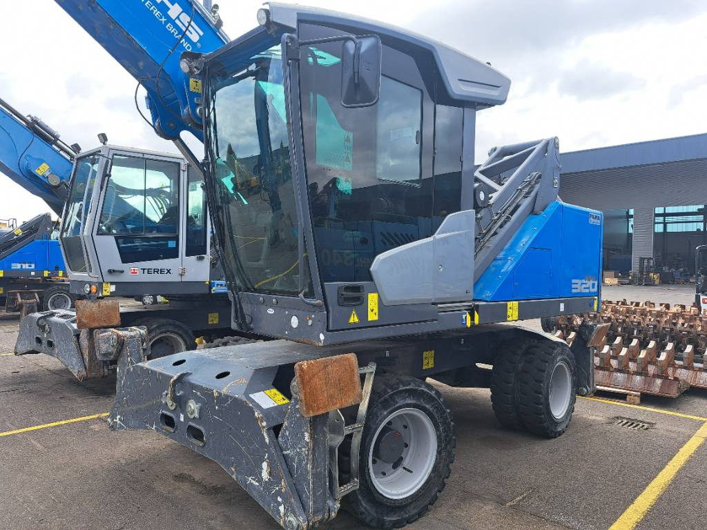 Fuchs MHL320F + Grapple - Waste/ Industry handler: picture 3 Fuchs MHL320F + Grapple - Waste/ Industry handler: picture 3