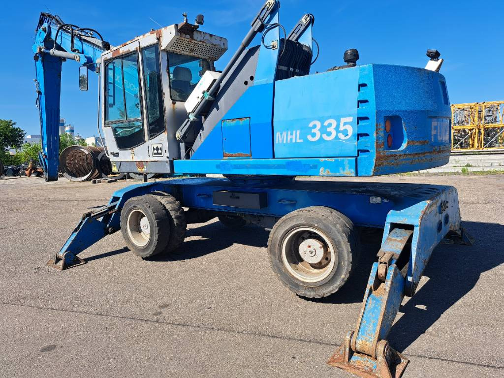 Fuchs MHL335 + Grapple + Reman Engine - Waste/ Industry handler: picture 1 Fuchs MHL335 + Grapple + Reman Engine - Waste/ Industry handler: picture 1
