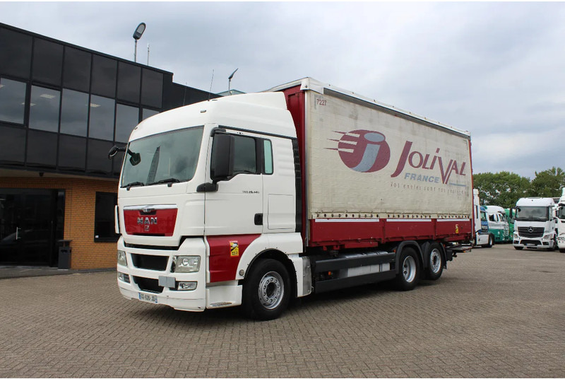MAN TGX 26.440 * EURO5 * 6X2 * LIFT AXLE * - Curtainsider truck: picture 1 MAN TGX 26.440 * EURO5 * 6X2 * LIFT AXLE * - Curtainsider truck: picture 1