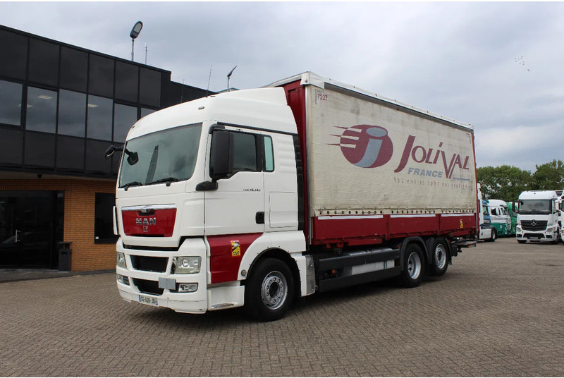 MAN TGX 26.440 * EURO5 * 6X2 * LIFT AXLE * - Curtainsider truck: picture 2 MAN TGX 26.440 * EURO5 * 6X2 * LIFT AXLE * - Curtainsider truck: picture 2