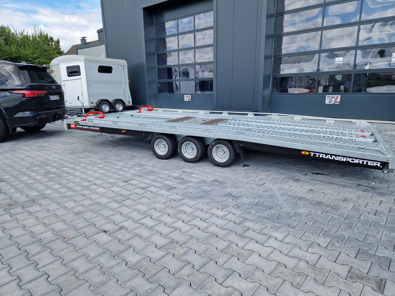 BJT T Transporter 231 550x224cm schwarz Auffahrrampen 235cm Tridem 10" 3500kg (XXL) - Autotransporter trailer: picture 5 BJT T Transporter 231 550x224cm schwarz Auffahrrampen 235cm Tridem 10" 3500kg (XXL) - Autotransporter trailer: picture 5