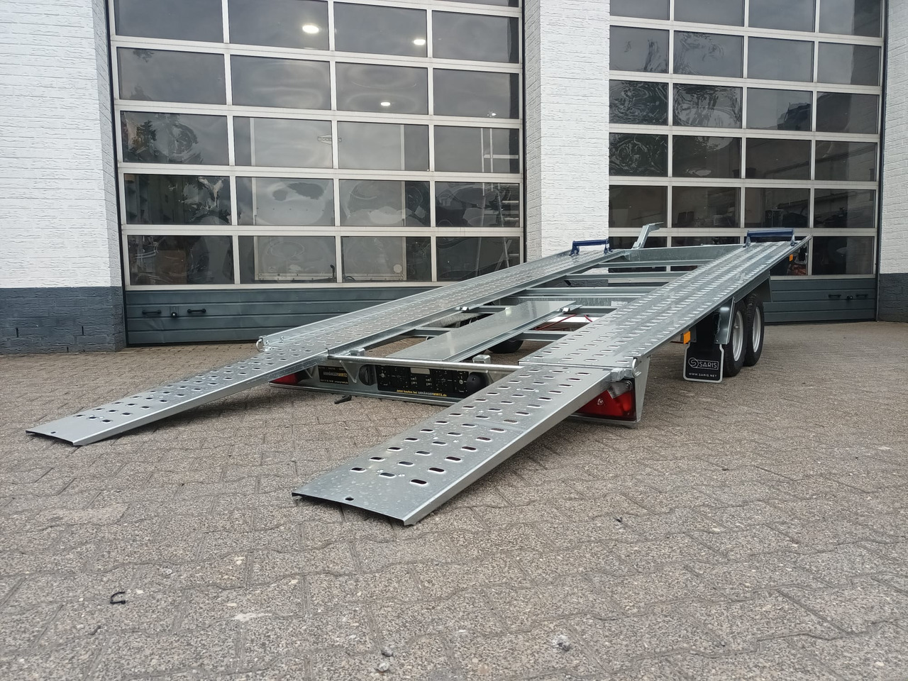 Saris Cartrailer AT 401 202 2700 2 K easyload ankippbar Rampen Fahrschienen Radstop 2700kg 100km/H - Autotransporter trailer: picture 1 Saris Cartrailer AT 401 202 2700 2 K easyload ankippbar Rampen Fahrschienen Radstop 2700kg 100km/H - Autotransporter trailer: picture 1