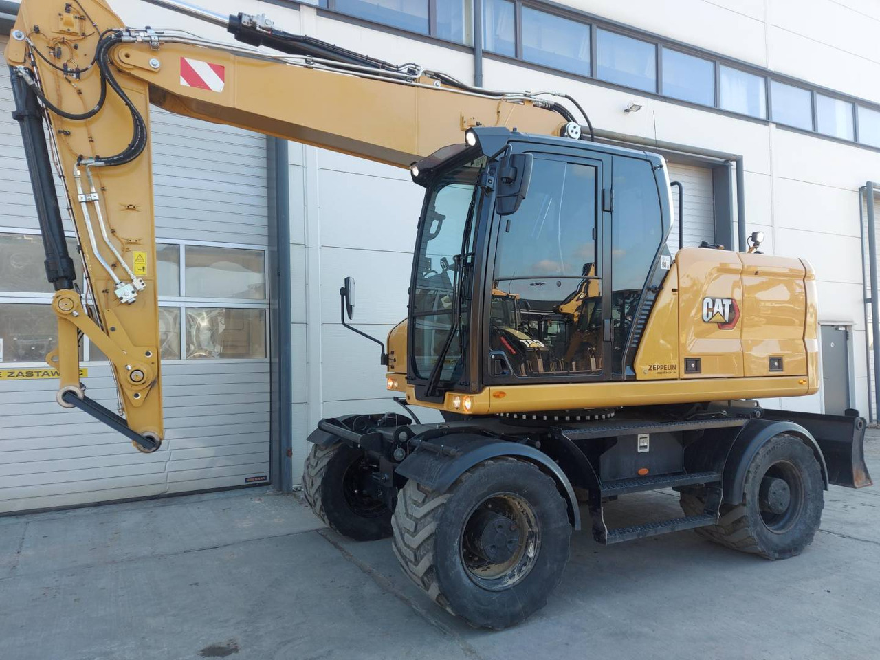 CAT M 318 - Wheel excavator: picture 1 CAT M 318 - Wheel excavator: picture 1