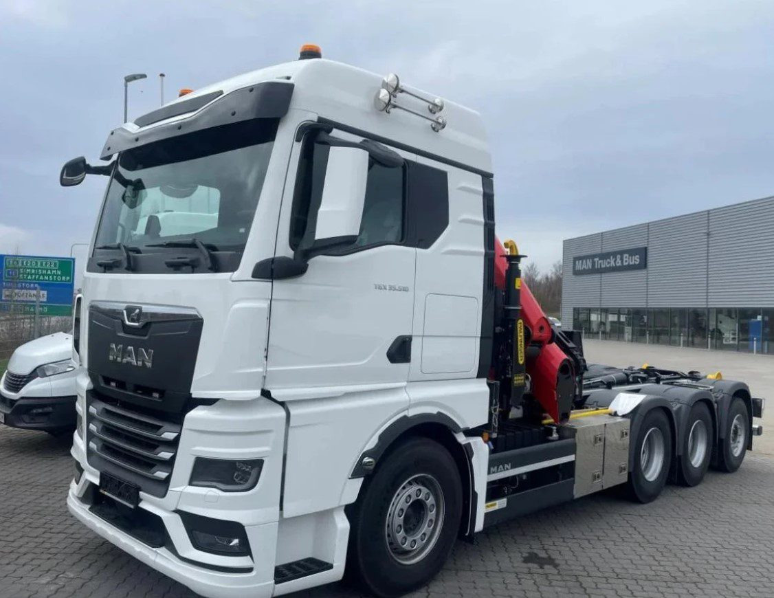 MAN TGS 35.510 8×4 Tridem kranväxlare Palfinger - Hook lift truck, Crane truck: picture 1 MAN TGS 35.510 8×4 Tridem kranväxlare Palfinger - Hook lift truck, Crane truck: picture 1