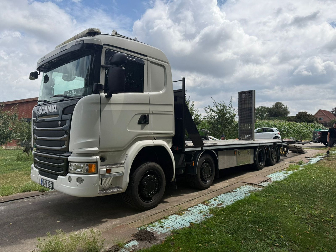 Scania G450 Baumaschinentransporter mit Rampen - Dropside/ Flatbed truck: picture 1 Scania G450 Baumaschinentransporter mit Rampen - Dropside/ Flatbed truck: picture 1
