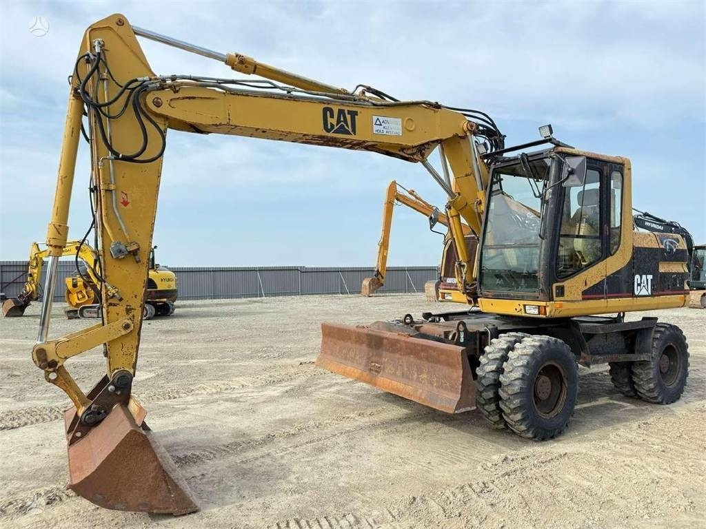CAT M 312, SCANDINAVIAN - Wheel excavator: picture 1 CAT M 312, SCANDINAVIAN - Wheel excavator: picture 1