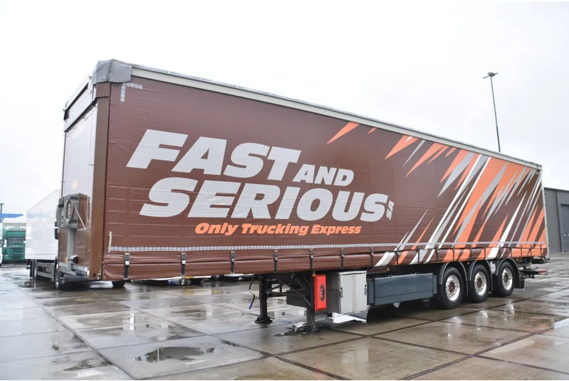 Fruehauf SLIDING CURTAINS/ROOF - TOPLIFT SYSTEM - LIFT AXLE - STEERING AXLE - SAF AXLES - ALCOA'S - DHOLLANDIA - TOP CONDITION - - Curtainsider semi-trailer: picture 5 Fruehauf SLIDING CURTAINS/ROOF - TOPLIFT SYSTEM - LIFT AXLE - STEERING AXLE - SAF AXLES - ALCOA'S - DHOLLANDIA - TOP CONDITION - - Curtainsider semi-trailer: picture 5