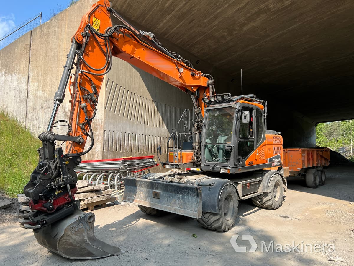 Hjulgrävare Doosan DX160W med tillbehör - Crawler excavator: picture 1 Hjulgrävare Doosan DX160W med tillbehör - Crawler excavator: picture 1