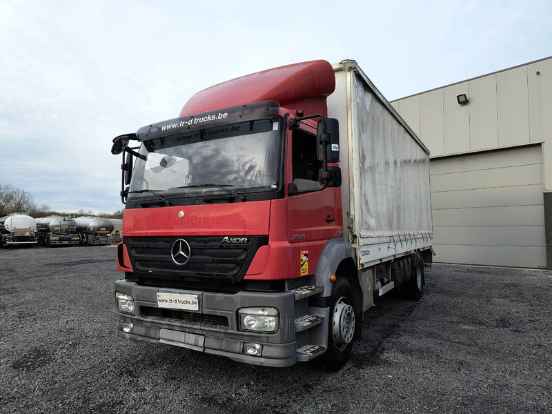 Mercedes-Benz Axor 1829 + D'HOLLANDIA 2000 KG - Curtainsider truck: picture 1 Mercedes-Benz Axor 1829 + D'HOLLANDIA 2000 KG - Curtainsider truck: picture 1