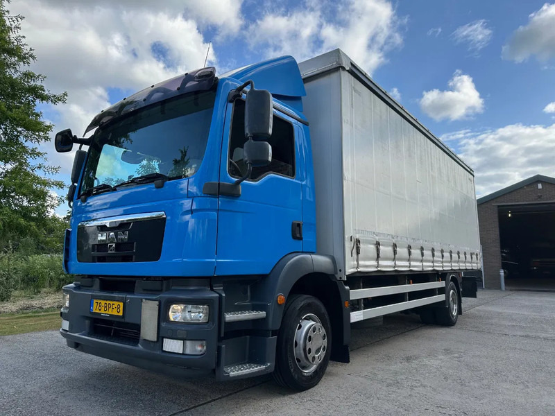 MAN TGM 12.250 / NL TRUCK / EURO 5 / SLIDING ROOF / BOX + TAILLIFT / FULL AIR / NAVI - Box truck: picture 1 MAN TGM 12.250 / NL TRUCK / EURO 5 / SLIDING ROOF / BOX + TAILLIFT / FULL AIR / NAVI - Box truck: picture 1