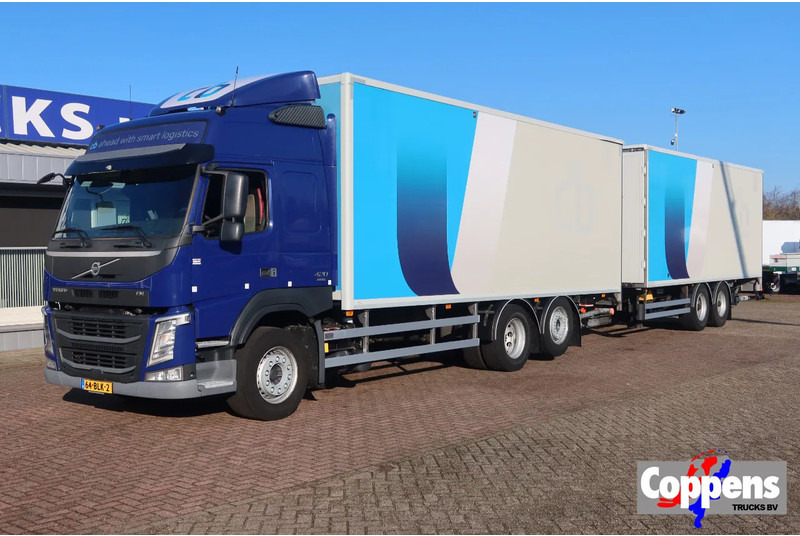 Volvo FM 420 6x2 Bak + Dhollandia klep 1500 kg + Aanhanger 94-WS-TS - Box truck: picture 1 Volvo FM 420 6x2 Bak + Dhollandia klep 1500 kg + Aanhanger 94-WS-TS - Box truck: picture 1
