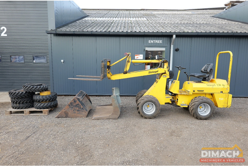 Striegel 150 DYA minishovel met 2 bakken en palletvorken en extra banden - Loader: picture 1 Striegel 150 DYA minishovel met 2 bakken en palletvorken en extra banden - Loader: picture 1