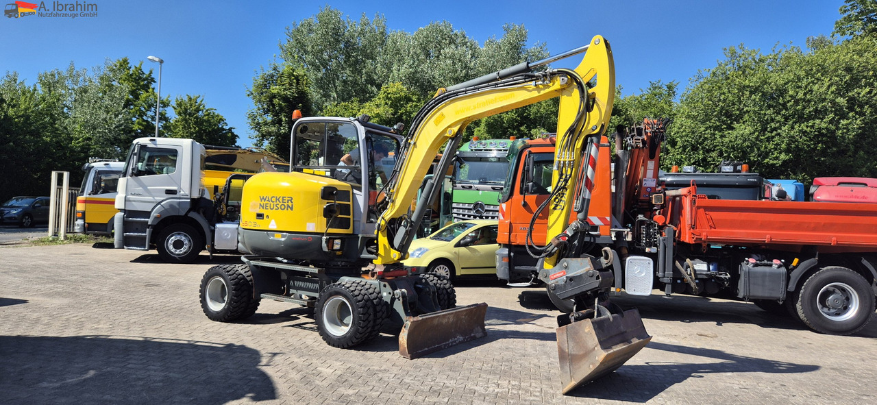 Wacker Neuson 6503 E05-07 schnellwechsler mit Oilquick | VERSTELLAUSLEGER | Klima | 2 Löffel - Wheel excavator: picture 1 Wacker Neuson 6503 E05-07 schnellwechsler mit Oilquick | VERSTELLAUSLEGER | Klima | 2 Löffel - Wheel excavator: picture 1