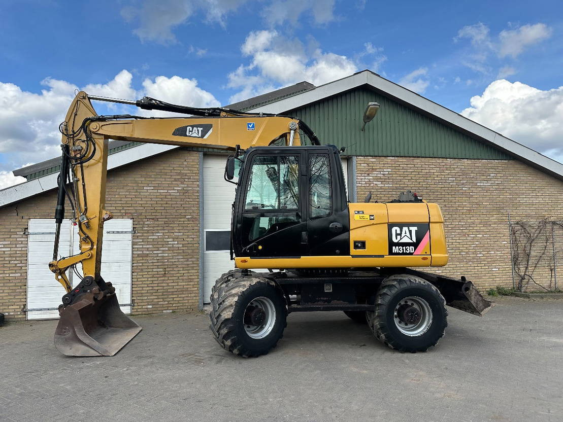 Caterpillar M313D - Wheel excavator: picture 1 Caterpillar M313D - Wheel excavator: picture 1
