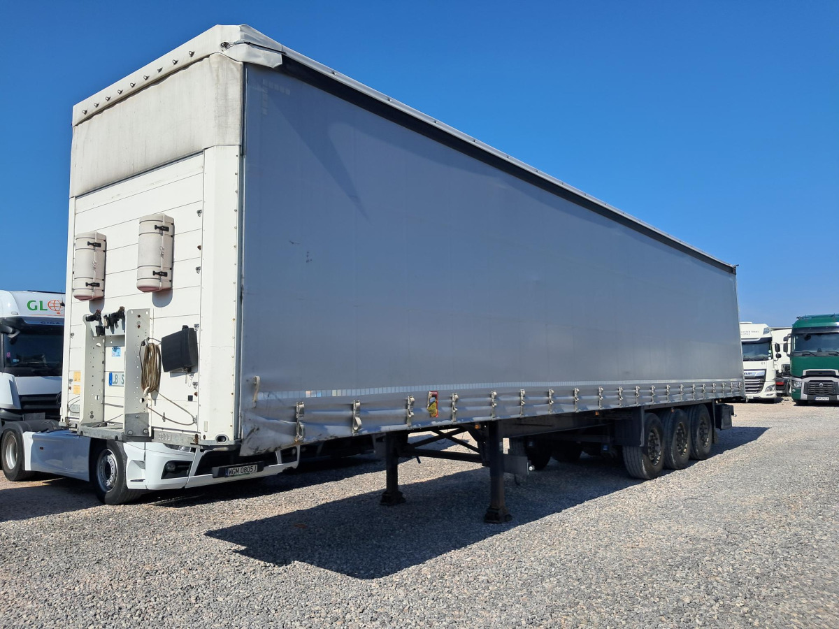 SCHMITZ SCS 24/L - 13.62 EB KURTYNOWA Z PODWIESZANYM WÓZKIEM WIDŁOWYM - Curtainsider trailer: picture 4 SCHMITZ SCS 24/L - 13.62 EB KURTYNOWA Z PODWIESZANYM WÓZKIEM WIDŁOWYM - Curtainsider trailer: picture 4