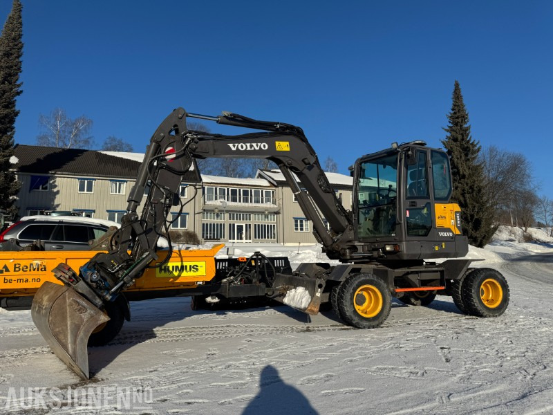 2022 Volvo EW60E HJULGRAVER MED HENGER, TILTROTATOR MED KLYPEKASETT, SKUFFER, SENTRALSMØRING - Excavator: picture 1 2022 Volvo EW60E HJULGRAVER MED HENGER, TILTROTATOR MED KLYPEKASETT, SKUFFER, SENTRALSMØRING - Excavator: picture 1
