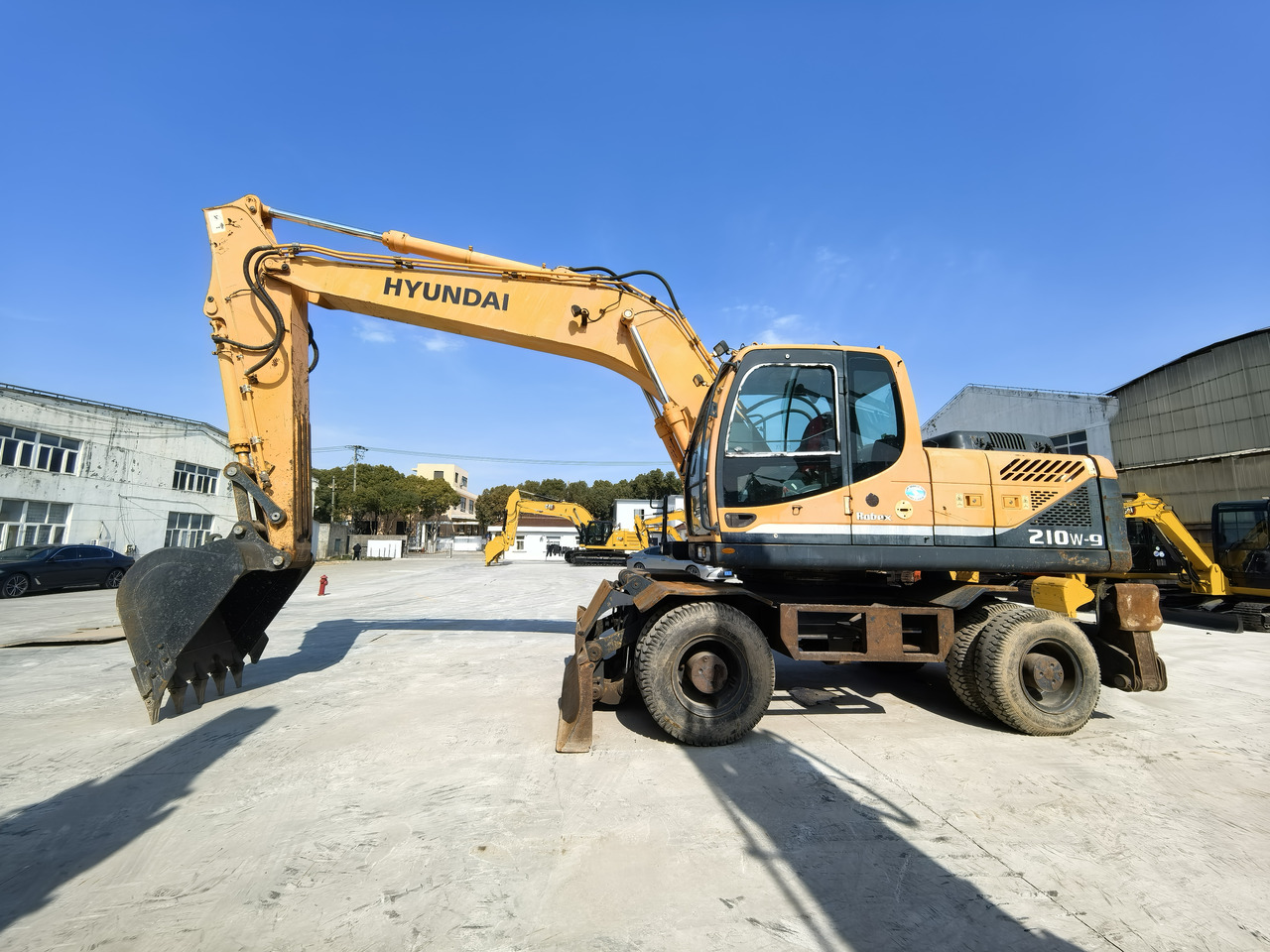 Hyundai 210w-9 wheel excavator - Wheel excavator: picture 1 Hyundai 210w-9 wheel excavator - Wheel excavator: picture 1