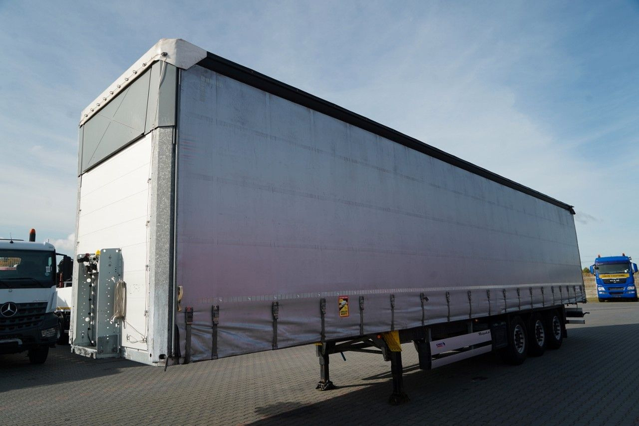 Schmitz Cargobull / FIRANKA / STANDARD / OŚ PODNOSZONA / DACH PODN - Curtainsider semi-trailer: picture 4 Schmitz Cargobull / FIRANKA / STANDARD / OŚ PODNOSZONA / DACH PODN - Curtainsider semi-trailer: picture 4