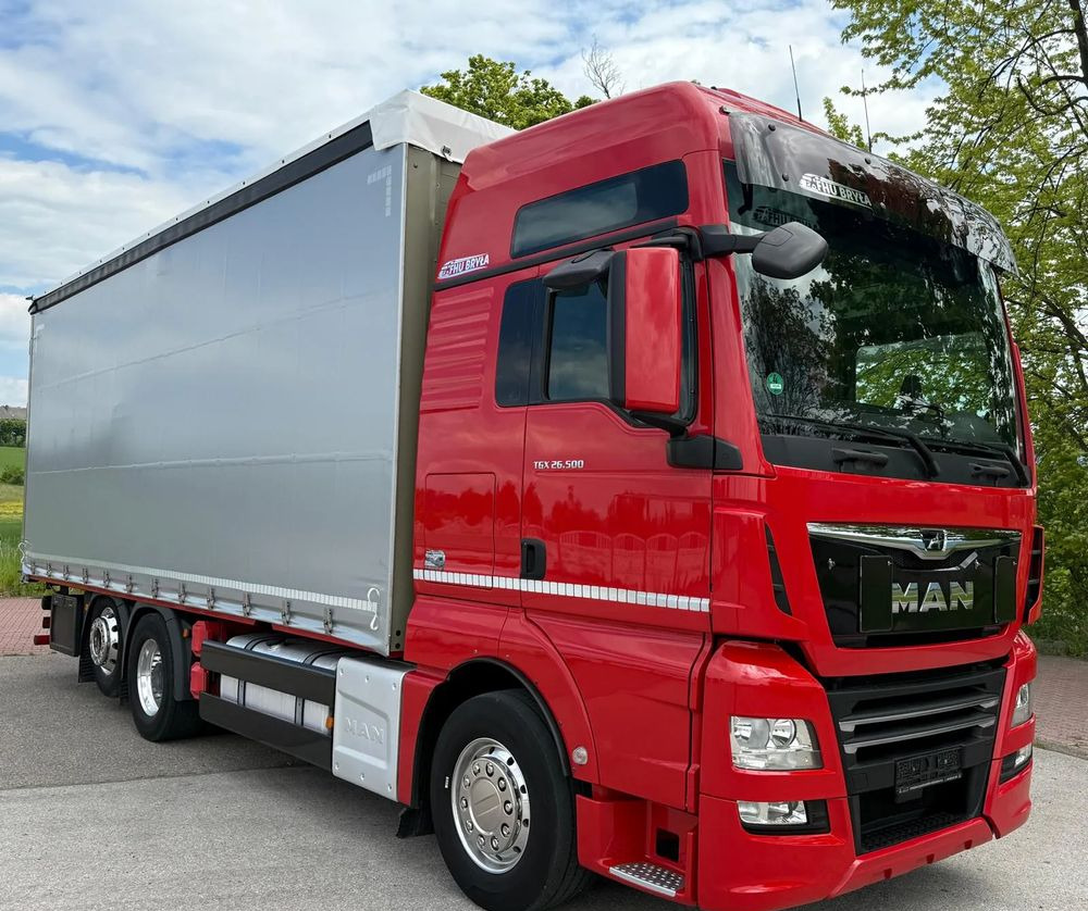 MAN TGX 26.500 / LIFT / 6X2 / KLIMA POSTOJOWA / 18PALET / E6 / FIRANKA / 18 TON ŁADOWNOŚĆ / WINDA / NISKI PRZEBIEG / JEDEN WŁAŚCICIEL / PODWIESZANA OŚ - Curtainsider truck: picture 2 MAN TGX 26.500 / LIFT / 6X2 / KLIMA POSTOJOWA / 18PALET / E6 / FIRANKA / 18 TON ŁADOWNOŚĆ / WINDA / NISKI PRZEBIEG / JEDEN WŁAŚCICIEL / PODWIESZANA OŚ - Curtainsider truck: picture 2