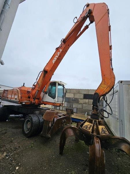 Atlas 1704 MI mit Greifer Umschlagbagger Lang - Wheel excavator: picture 1 Atlas 1704 MI mit Greifer Umschlagbagger Lang - Wheel excavator: picture 1