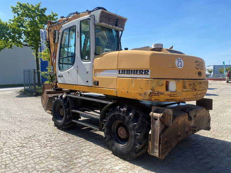 Liebherr A316 Litronic A 316 litronic - Wheel excavator: picture 1 Liebherr A316 Litronic A 316 litronic - Wheel excavator: picture 1