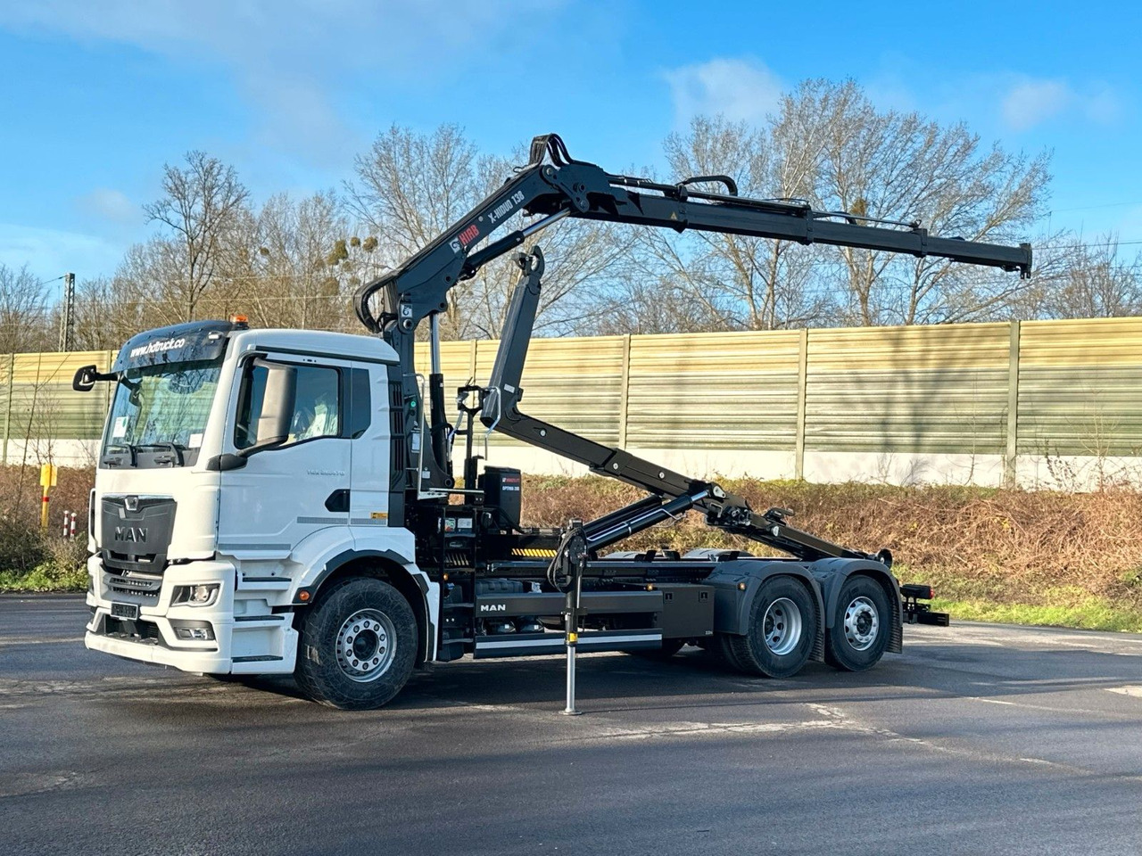 MAN TGS 26.470 6x2 Abrollkipper + Kran Hiab 138-3 - Hook lift truck, Crane truck: picture 1 MAN TGS 26.470 6x2 Abrollkipper + Kran Hiab 138-3 - Hook lift truck, Crane truck: picture 1