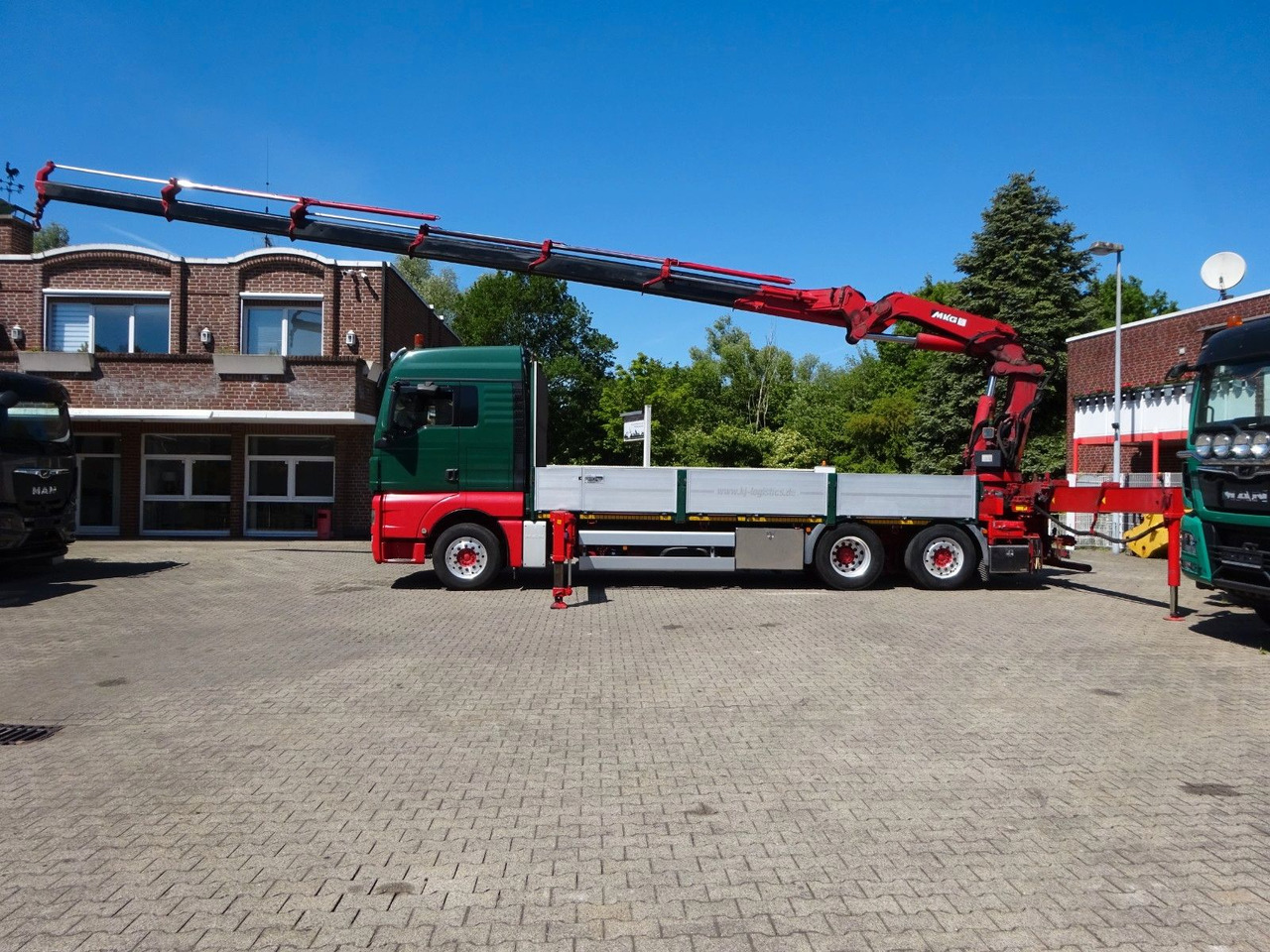 MAN 26.480 TGX + MKG HLK531 Kran +Lift-Lenkachse - Dropside/ Flatbed truck, Crane truck: picture 1 MAN 26.480 TGX + MKG HLK531 Kran +Lift-Lenkachse - Dropside/ Flatbed truck, Crane truck: picture 1