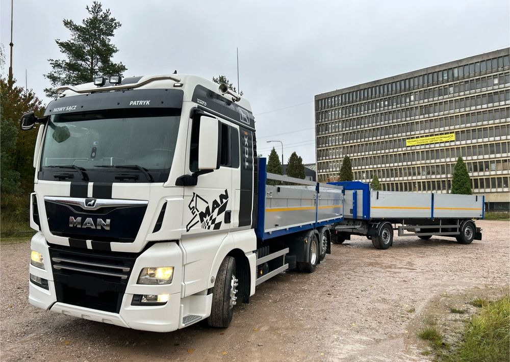 MAN TGX Tandem 1m burty TOP KOMPLET / ALUFELGI / zarejestrowany gotowy do pracy / przyczepa 18t / FULL OPCJA / 26.420 26.460 26.500 26.400 26.440 26.480 26.510 460 500 - Dropside/ Flatbed truck: picture 1 MAN TGX Tandem 1m burty TOP KOMPLET / ALUFELGI / zarejestrowany gotowy do pracy / przyczepa 18t / FULL OPCJA / 26.420 26.460 26.500 26.400 26.440 26.480 26.510 460 500 - Dropside/ Flatbed truck: picture 1