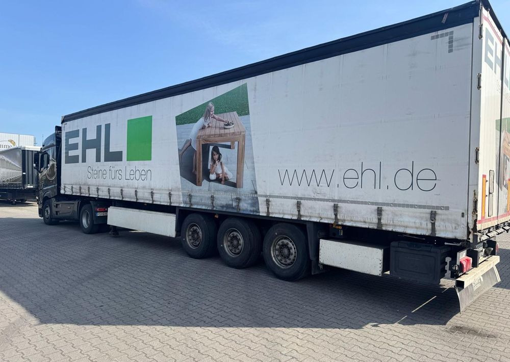 Schmitz Cargobull Standard 2016 z Niemiec ALUFELGI czarna lub srebrna / OŚ PODNOSZONA / ładne opony / od pierwszego właściciela / PALECIARA / OKAZJA - Curtainsider semi-trailer: picture 5 Schmitz Cargobull Standard 2016 z Niemiec ALUFELGI czarna lub srebrna / OŚ PODNOSZONA / ładne opony / od pierwszego właściciela / PALECIARA / OKAZJA - Curtainsider semi-trailer: picture 5