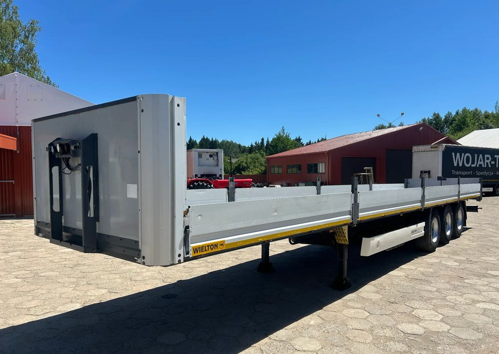 Wielton PLATFORMA BURTOWA / BUDOWLANA / OŚ PODNOSZONA / 2017 ROK !! - Dropside/ Flatbed semi-trailer: picture 1 Wielton PLATFORMA BURTOWA / BUDOWLANA / OŚ PODNOSZONA / 2017 ROK !! - Dropside/ Flatbed semi-trailer: picture 1