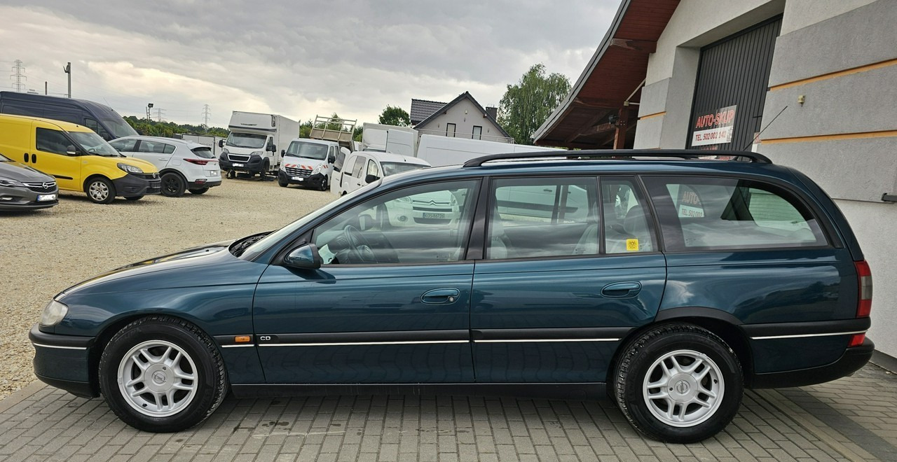 Opel Omega B 2,5 v6 *automat* napęd tył *welury* - Car: picture 4 Opel Omega B 2,5 v6 *automat* napęd tył *welury* - Car: picture 4