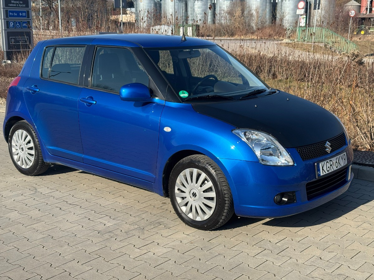 Suzuki Swift 1.3 benzyna 90km Klimatyzacja 136tys przebieg Auto prywatne zadbane - Car: picture 2 Suzuki Swift 1.3 benzyna 90km Klimatyzacja 136tys przebieg Auto prywatne zadbane - Car: picture 2
