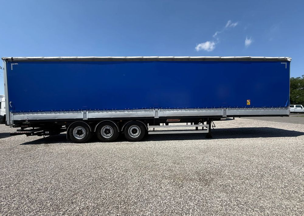 Fruehauf OSIE SAF BURTO FIRANKA PODNOSZONA OŚ - Curtainsider semi-trailer: picture 4 Fruehauf OSIE SAF BURTO FIRANKA PODNOSZONA OŚ - Curtainsider semi-trailer: picture 4